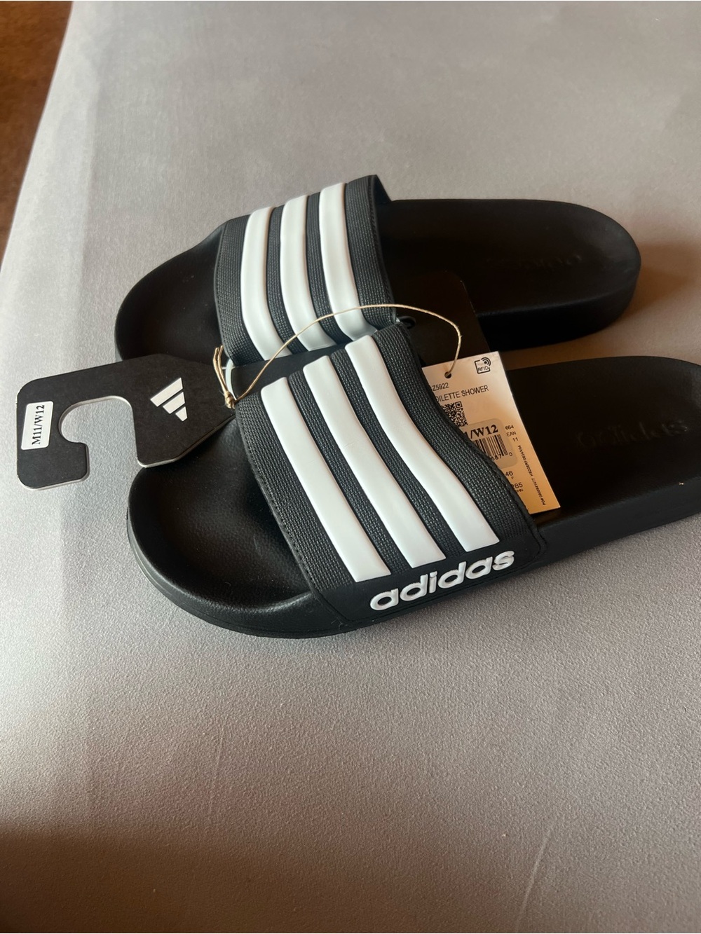 Adidas Black Cloud Foam Adilette Shower Slides.  Fits men’s 11 & women’s 12, new